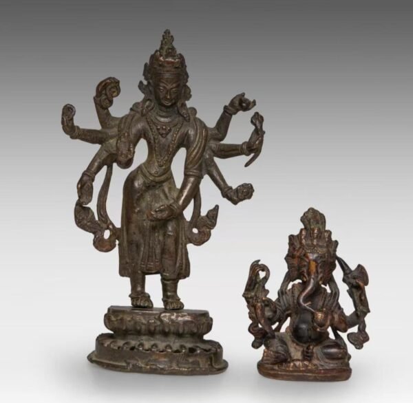 A bronze figure of Dipa-Lakshmi