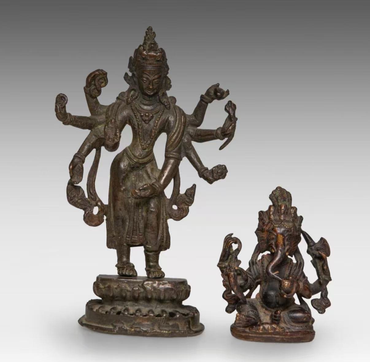 A bronze figure of Dipa-Lakshmi